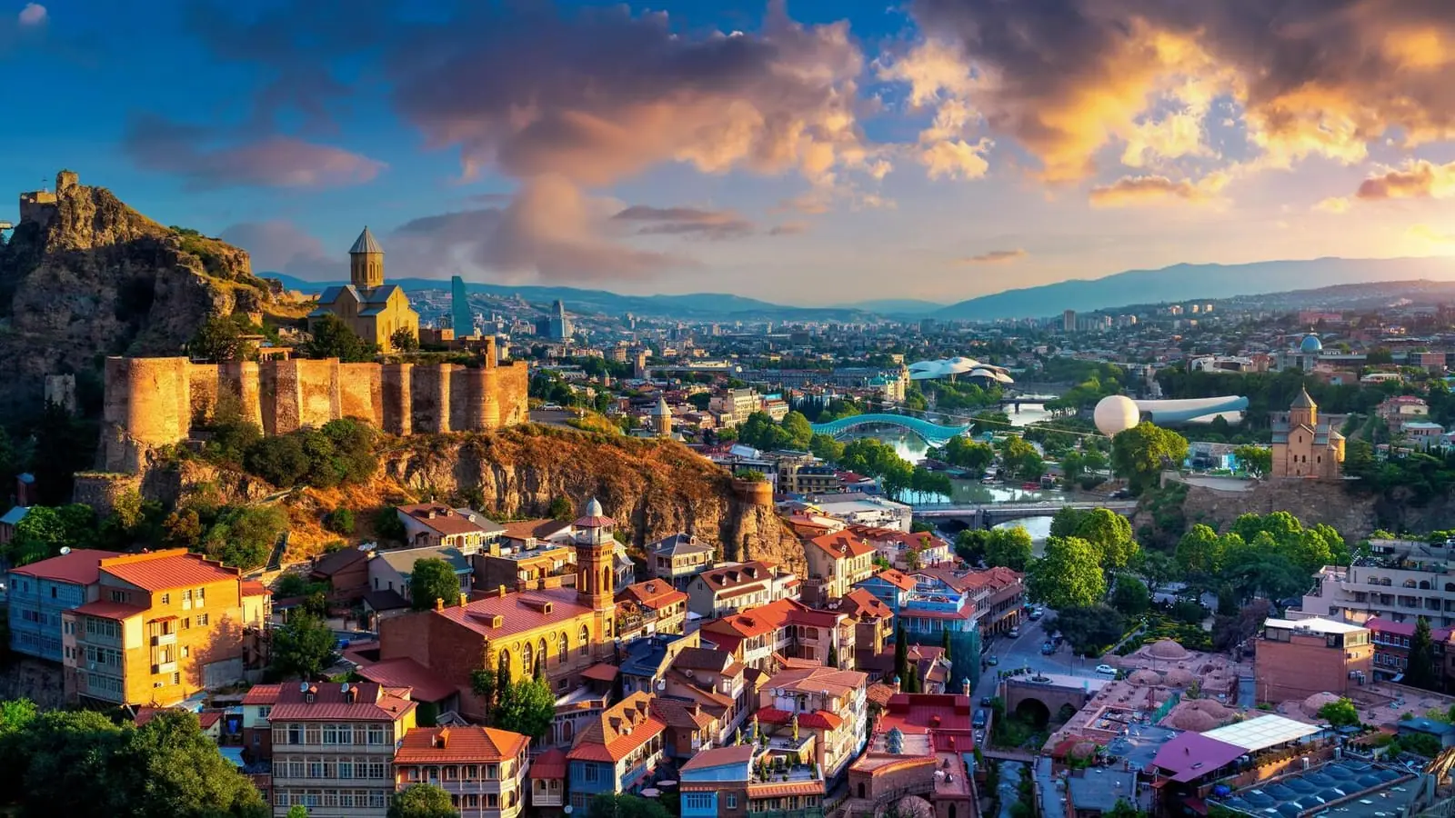 Tbilisi old town and the surrounding hills at dusk