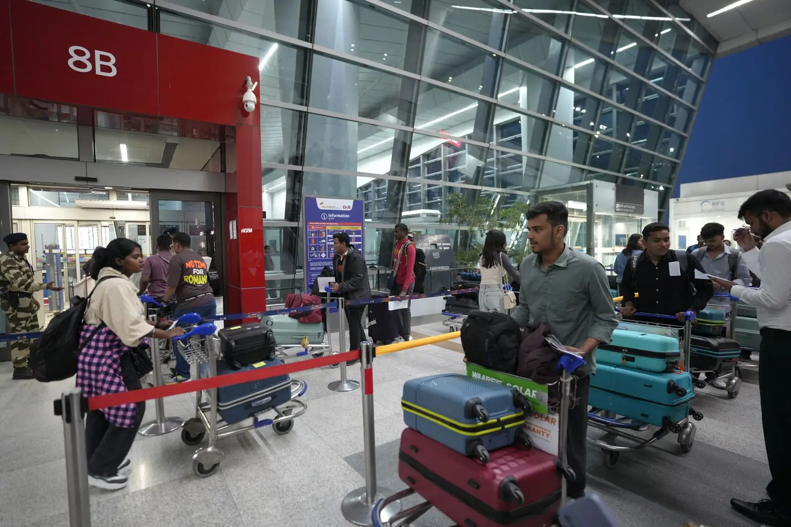 A student being seen off by family at the airport before leaving to study medicine abroad