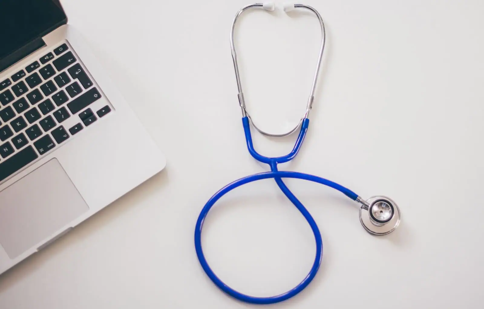 A stethoscope on a desk